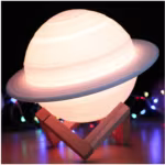 Lámpara de noche Saturno con soporte de luz nocturna y control remoto en Lima